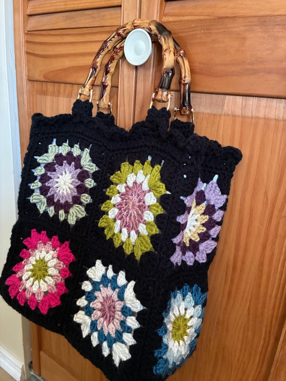 Handmade Black Crochet Tote Bag with Multicolor Floral Squares - Picture 4 of 5